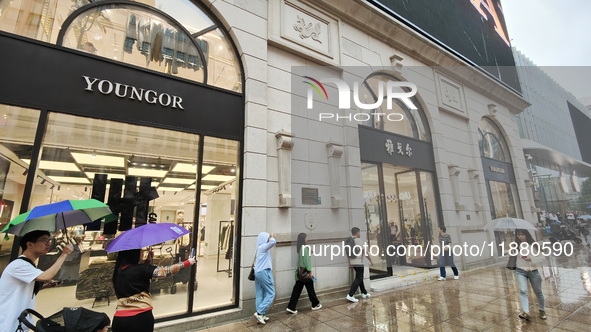 The newly opened Youngor Clothing Mall is on Nanjing Road pedestrian street in Shanghai, China, on October 15, 2024. 