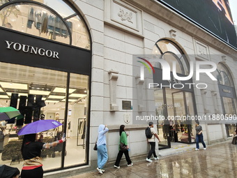 The newly opened Youngor Clothing Mall is on Nanjing Road pedestrian street in Shanghai, China, on October 15, 2024. (