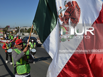 Mexican migrants who have been deported from the United States to Mexico, families seeking asylum, and activists demonstrate for migrants' r...