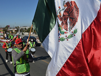 Mexican migrants who have been deported from the United States to Mexico, families seeking asylum, and activists demonstrate for migrants' r...