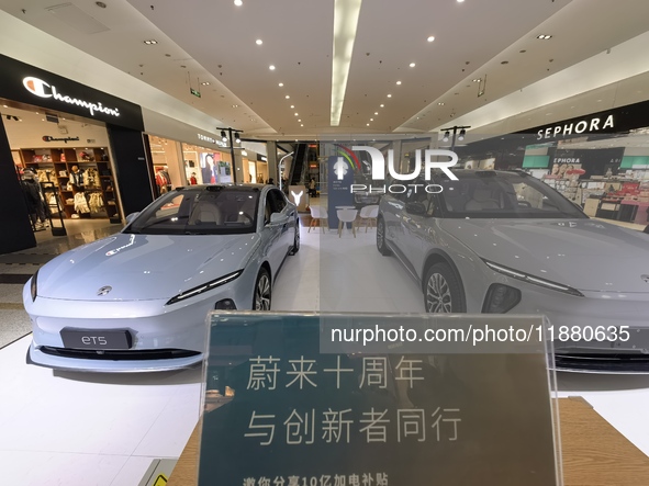 Nio new energy vehicles are displayed at Jinyuan Shopping Center, Beijing's largest shopping and leisure complex, in Beijing, China, on Dece...