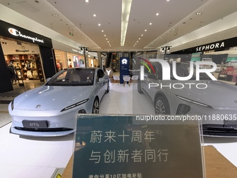 Nio new energy vehicles are displayed at Jinyuan Shopping Center, Beijing's largest shopping and leisure complex, in Beijing, China, on Dece...