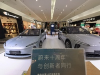 Nio new energy vehicles are displayed at Jinyuan Shopping Center, Beijing's largest shopping and leisure complex, in Beijing, China, on Dece...