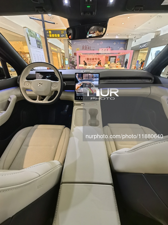 Nio new energy vehicles are displayed at Jinyuan Shopping Center, Beijing's largest shopping and leisure complex, in Beijing, China, on Dece...