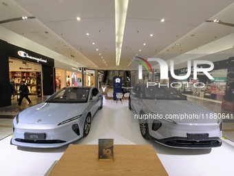 Nio new energy vehicles are displayed at Jinyuan Shopping Center, Beijing's largest shopping and leisure complex, in Beijing, China, on Dece...