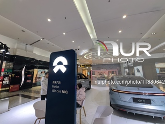 Nio new energy vehicles are displayed at Jinyuan Shopping Center, Beijing's largest shopping and leisure complex, in Beijing, China, on Dece...