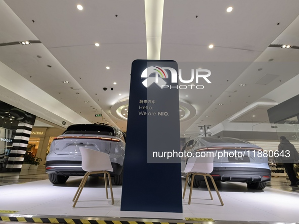 Nio new energy vehicles are displayed at Jinyuan Shopping Center, Beijing's largest shopping and leisure complex, in Beijing, China, on Dece...