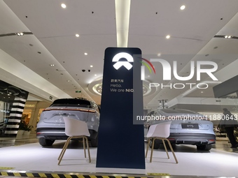 Nio new energy vehicles are displayed at Jinyuan Shopping Center, Beijing's largest shopping and leisure complex, in Beijing, China, on Dece...