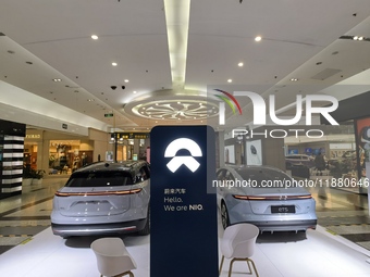 Nio new energy vehicles are displayed at Jinyuan Shopping Center, Beijing's largest shopping and leisure complex, in Beijing, China, on Dece...