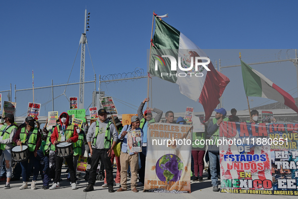 Mexican migrants who have been deported from the United States to Mexico, families seeking asylum, and activists demonstrate for migrants' r...