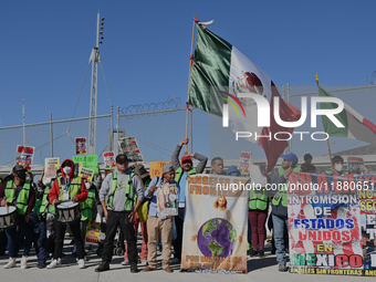 Mexican migrants who have been deported from the United States to Mexico, families seeking asylum, and activists demonstrate for migrants' r...