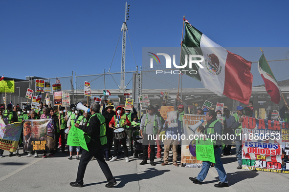 Mexican migrants who have been deported from the United States to Mexico, families seeking asylum, and activists demonstrate for migrants' r...