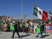 Mexican migrants who have been deported from the United States to Mexico, families seeking asylum, and activists demonstrate for migrants' r...