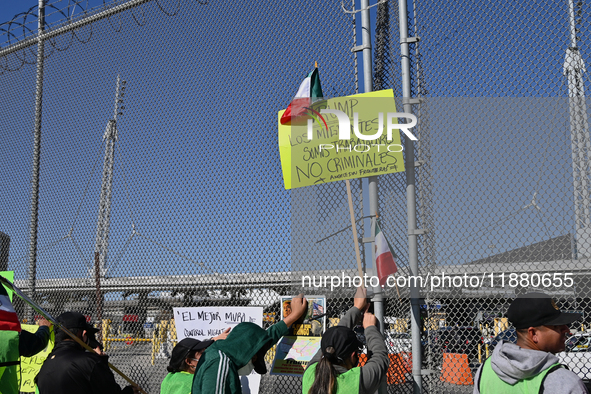 Mexican migrants who have been deported from the United States to Mexico, families seeking asylum, and activists demonstrate for migrants' r...