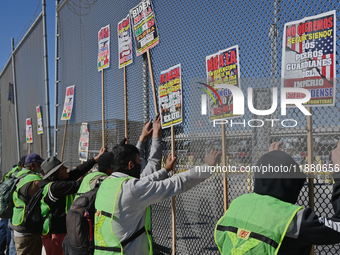 Mexican migrants who have been deported from the United States to Mexico, families seeking asylum, and activists demonstrate for migrants' r...