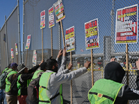 Mexican migrants who have been deported from the United States to Mexico, families seeking asylum, and activists demonstrate for migrants' r...