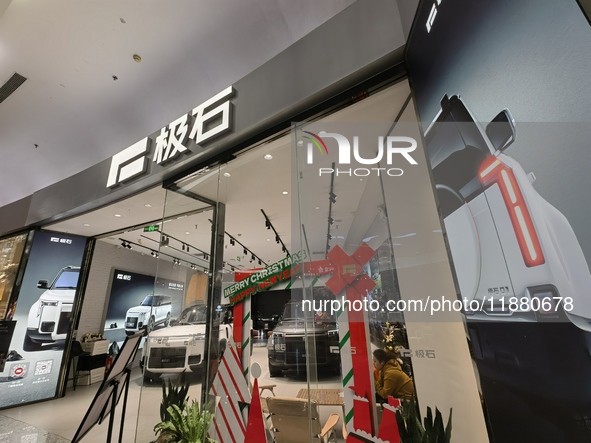 ROX new energy vehicles are displayed at Jinyuan Shopping Center, Beijing's largest shopping and leisure complex, in Beijing, China, on Dece...