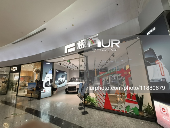 ROX new energy vehicles are displayed at Jinyuan Shopping Center, Beijing's largest shopping and leisure complex, in Beijing, China, on Dece...