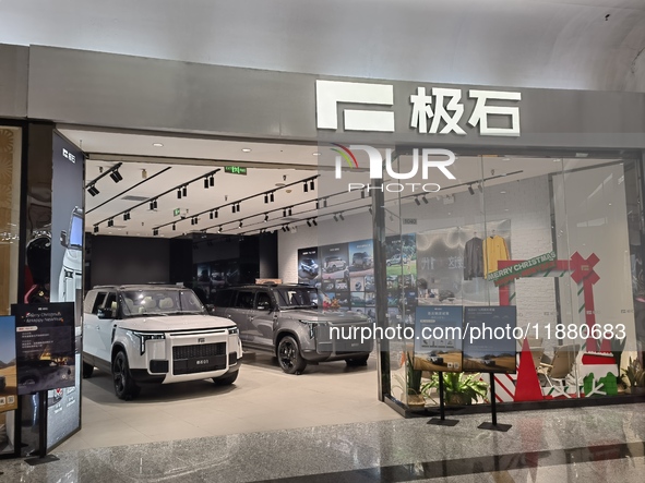 ROX new energy vehicles are displayed at Jinyuan Shopping Center, Beijing's largest shopping and leisure complex, in Beijing, China, on Dece...