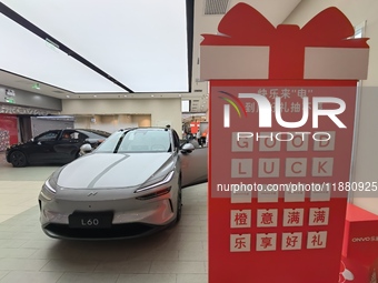 Nio's ONVO new energy vehicle is displayed at Jinyuan Shopping Center, Beijing's largest shopping and leisure complex, in Beijing, China, on...