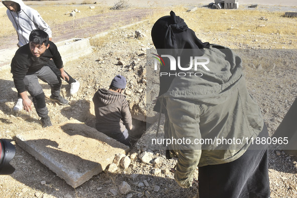 Another mass grave is uncovered in the Baghdad Bridge area of the Syrian capital Damascus on December 18, 2024, in Damascus, Syria. 