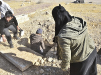 Another mass grave is uncovered in the Baghdad Bridge area of the Syrian capital Damascus on December 18, 2024, in Damascus, Syria. (