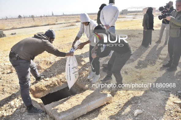 Another mass grave is uncovered in the Baghdad Bridge area of the Syrian capital Damascus on December 18, 2024, in Damascus, Syria. 