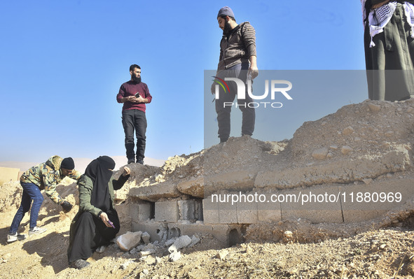 Another mass grave is uncovered in the Baghdad Bridge area of the Syrian capital Damascus on December 18, 2024, in Damascus, Syria. 