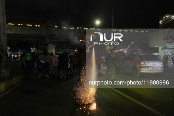 Residents of the town of Culhuacan in Mexico City, on December 18, 2024,  walk on a vehicular bridge while participating in a posada on Chri...