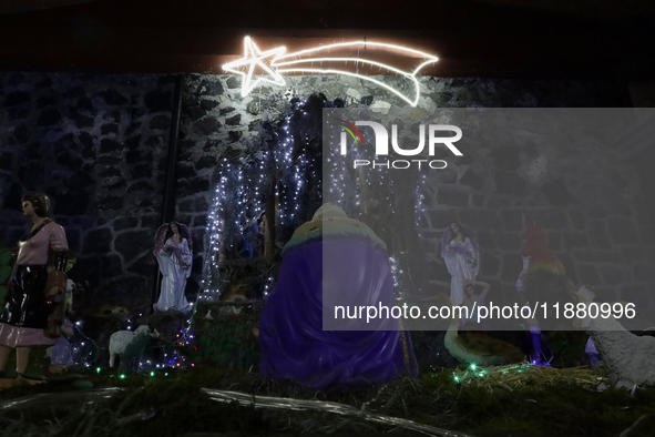 Residents of the town of Culhuacan in Mexico City, on December 18, 2024,  walk on a vehicular bridge while participating in a posada on Chri...