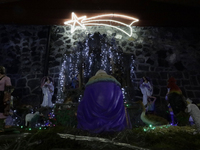 Residents of the town of Culhuacan in Mexico City, on December 18, 2024,  walk on a vehicular bridge while participating in a posada on Chri...