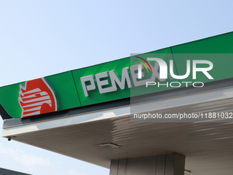 The logo of the Mexican state-owned oil company Petroleos Mexicanos (PEMEX) appears on the facade of a gas station in Mexico City, Mexico, o...