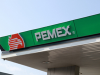 The logo of the Mexican state-owned oil company Petroleos Mexicanos (PEMEX) appears on the facade of a gas station in Mexico City, Mexico, o...