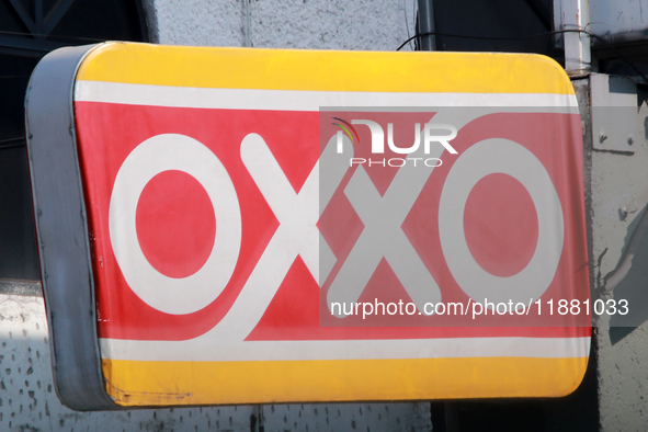 The logo of the Mexican convenience store company OXXO is on a facade in Mexico City, Mexico, on December 18, 2024. 