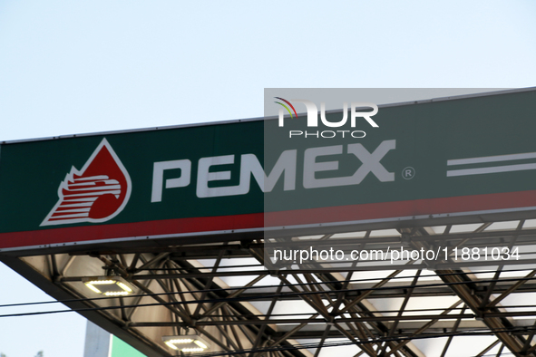 The logo of the Mexican state-owned oil company Petroleos Mexicanos (PEMEX) appears on the facade of a gas station in Mexico City, Mexico, o...