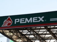 The logo of the Mexican state-owned oil company Petroleos Mexicanos (PEMEX) appears on the facade of a gas station in Mexico City, Mexico, o...