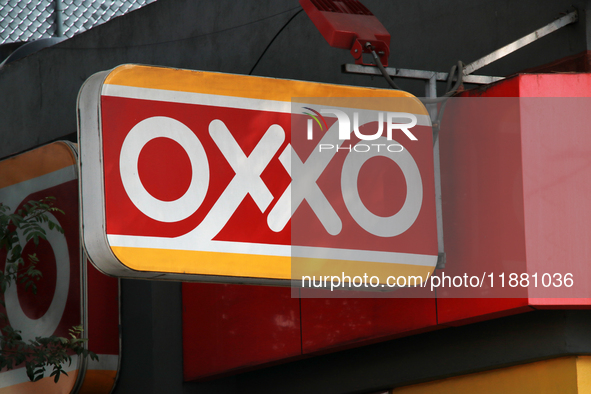 The logo of the Mexican convenience store company OXXO is on a facade in Mexico City, Mexico, on December 18, 2024. 