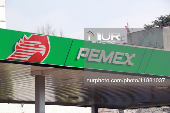 The logo of the Mexican state-owned oil company Petroleos Mexicanos (PEMEX) appears on the facade of a gas station in Mexico City, Mexico, o...