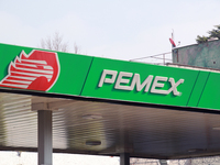 The logo of the Mexican state-owned oil company Petroleos Mexicanos (PEMEX) appears on the facade of a gas station in Mexico City, Mexico, o...