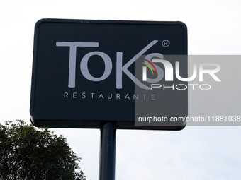 The logo of the Mexican family restaurant company Toks is seen in Mexico City, Mexico, on December 18, 2024. (