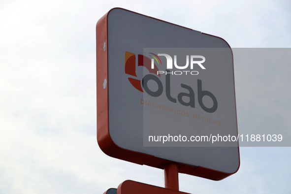 The logo of the medical diagnostics laboratory company Olab is seen in Mexico City, Mexico, on December 18, 2024. 