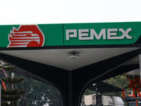 The logo of the Mexican state-owned oil company Petroleos Mexicanos (PEMEX) appears on the facade of a gas station in Mexico City, Mexico, o...