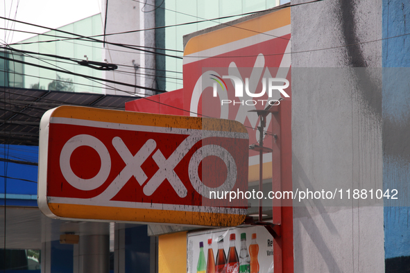 The logo of the Mexican convenience store company OXXO is on a facade in Mexico City, Mexico, on December 18, 2024. 