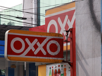 The logo of the Mexican convenience store company OXXO is on a facade in Mexico City, Mexico, on December 18, 2024. (