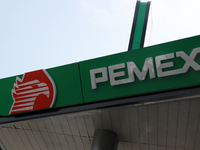 The logo of the Mexican state-owned oil company Petroleos Mexicanos (PEMEX) appears on the facade of a gas station in Mexico City, Mexico, o...