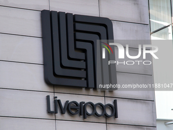 The logo of the Mexican department store company Liverpool is seen on a facade in Mexico City, Mexico, on December 18, 2024. (