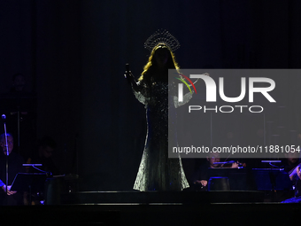 British singer Sarah Brightman performs on stage during the A Christmas Symphony Holiday Tour at Mexico City Arena in Mexico City, Mexico, o...