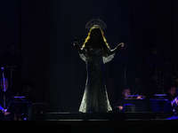 British singer Sarah Brightman performs on stage during the A Christmas Symphony Holiday Tour at Mexico City Arena in Mexico City, Mexico, o...