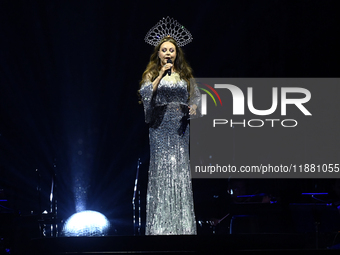 British singer Sarah Brightman performs on stage during the A Christmas Symphony Holiday Tour at Mexico City Arena in Mexico City, Mexico, o...