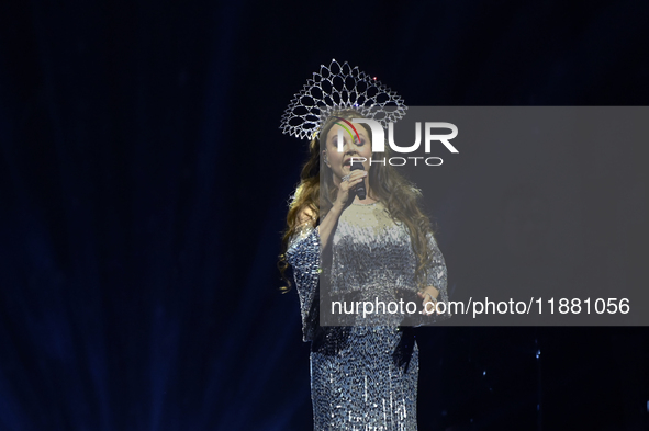 British singer Sarah Brightman performs on stage during the A Christmas Symphony Holiday Tour at Mexico City Arena in Mexico City, Mexico, o...